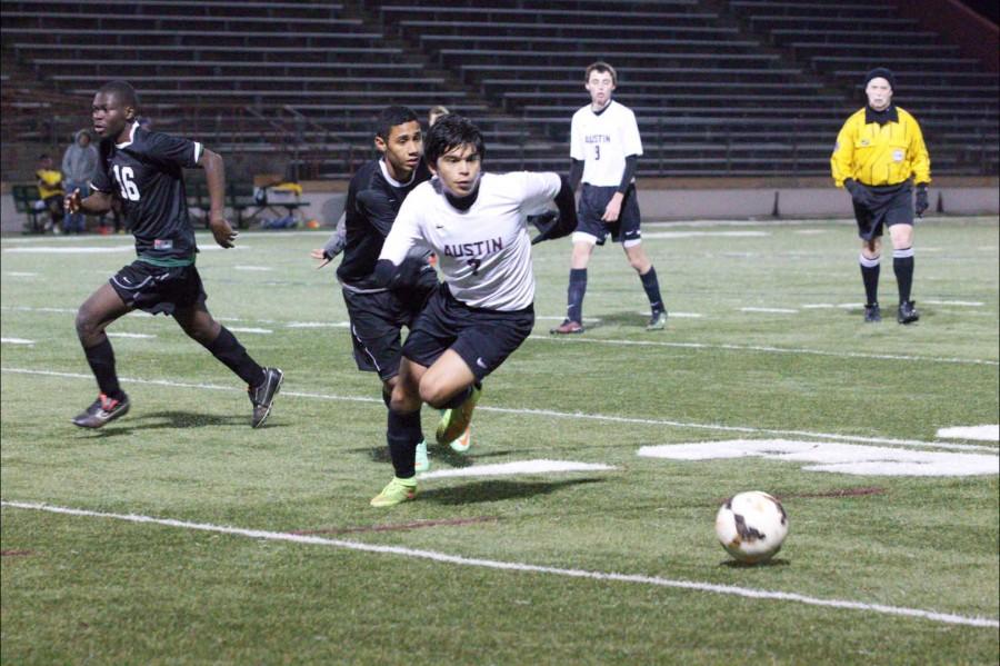 Junior Martin Medina competes for possession of the ball against the Eastside Memorial Panthers.