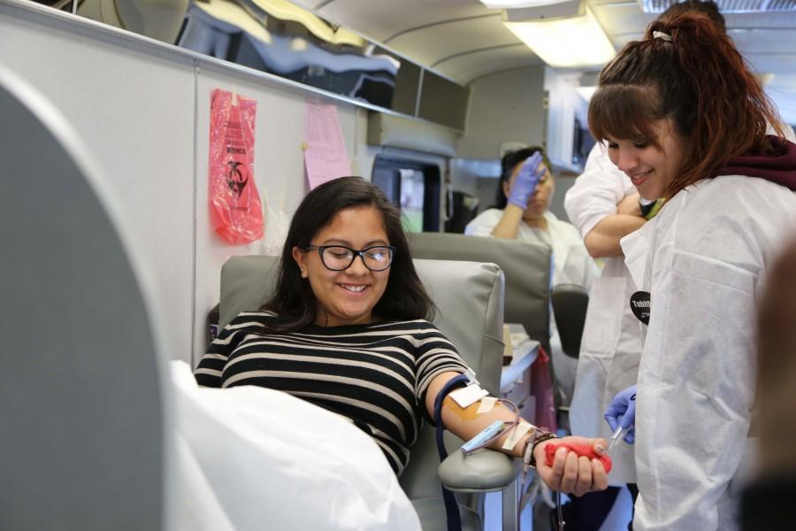 Senior Star Villafuerte donates blood for the National Honor Society's annual Blood Drive. 