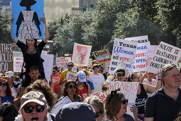 Record numbers of protesters take to the streets during the Womens March on Austin, Saturday, Jan. 21. 