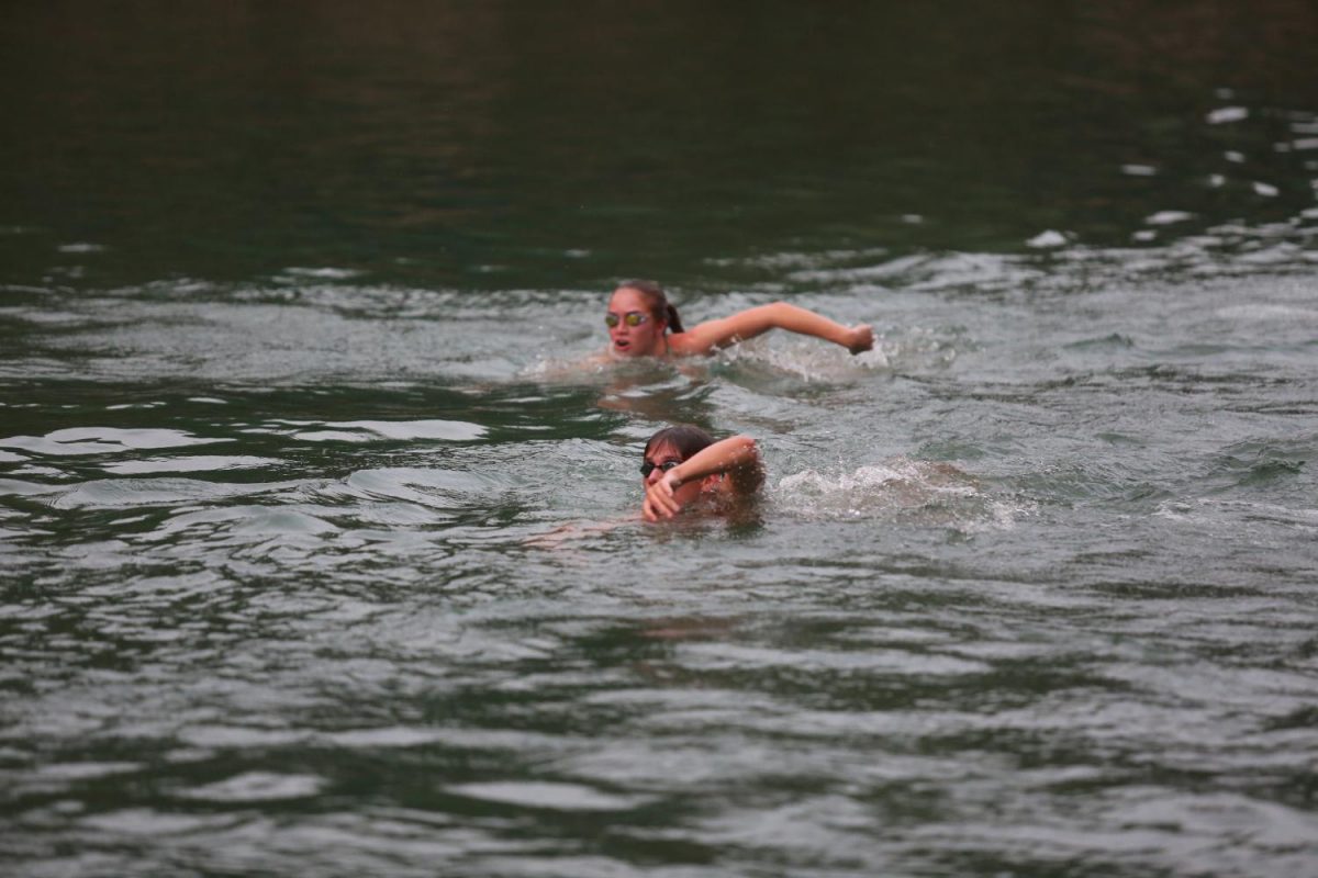 Swimmers race to the finish line in the 16th annual King and Queen of the Springs competition.