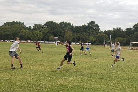 Senior Marty Carrillo catches a Frisbee mid-practice.